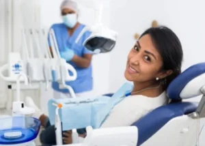 Patient smiling after dental bridge placement in a modern Chicago dental office
